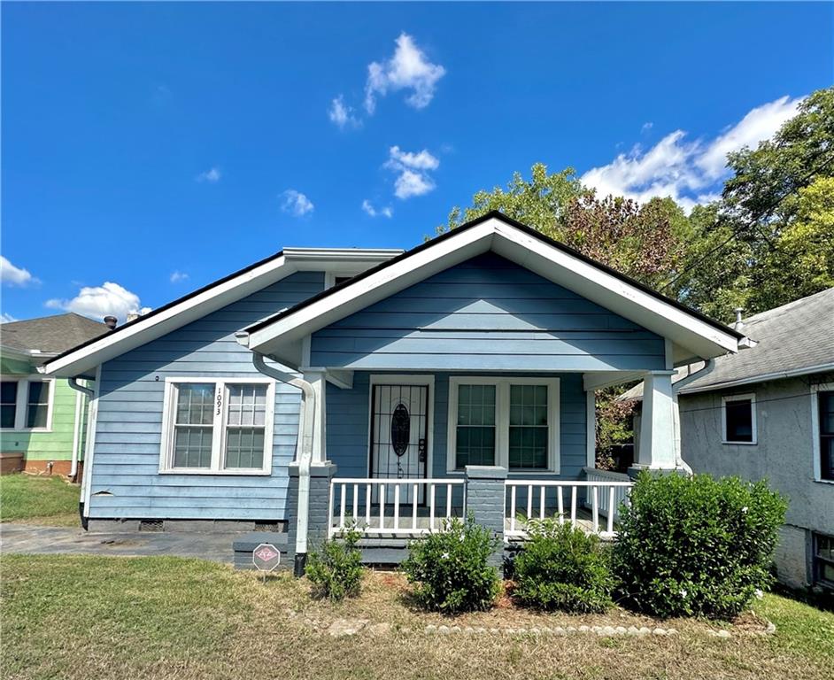 a front view of a house with yard