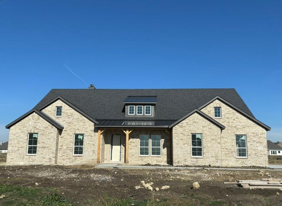 a front view of a house with a space