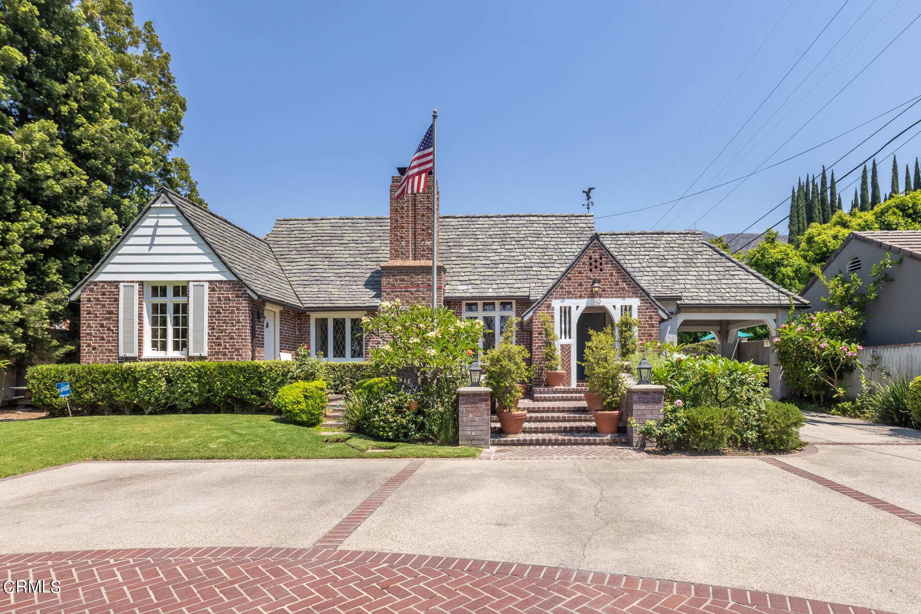 a house view with a garden space