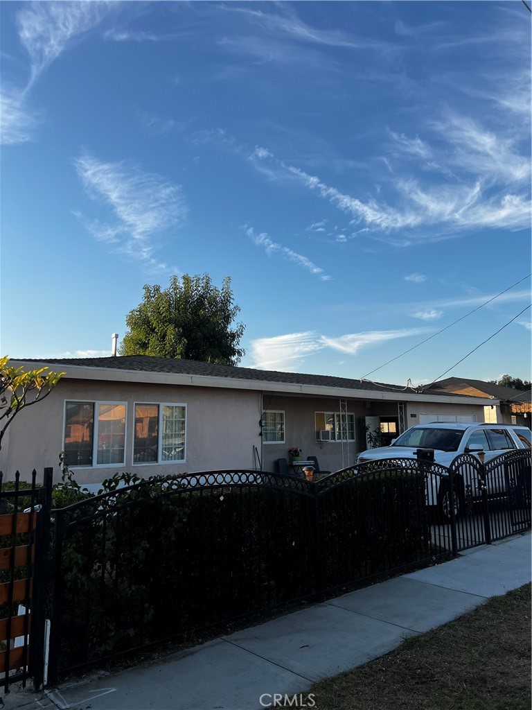 a view of house with outdoor space