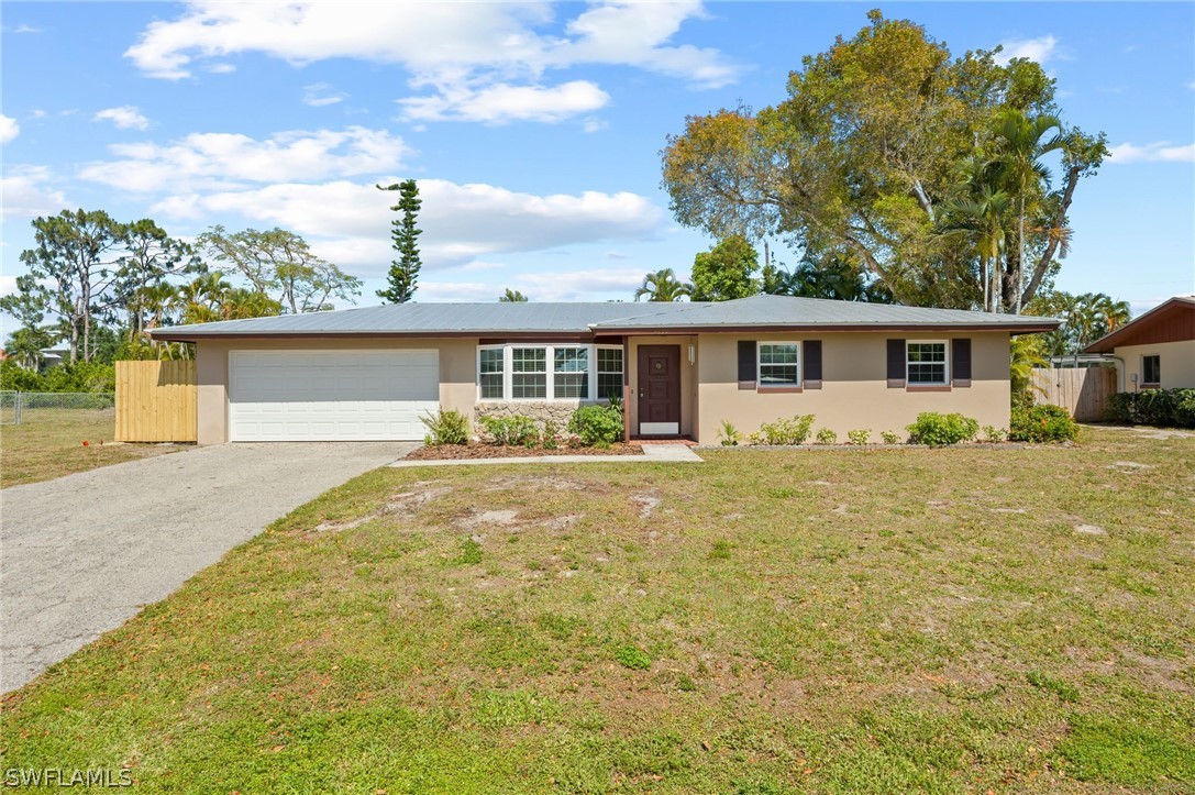 front view of house with a yard