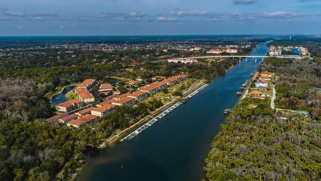 a view of a city with an ocean