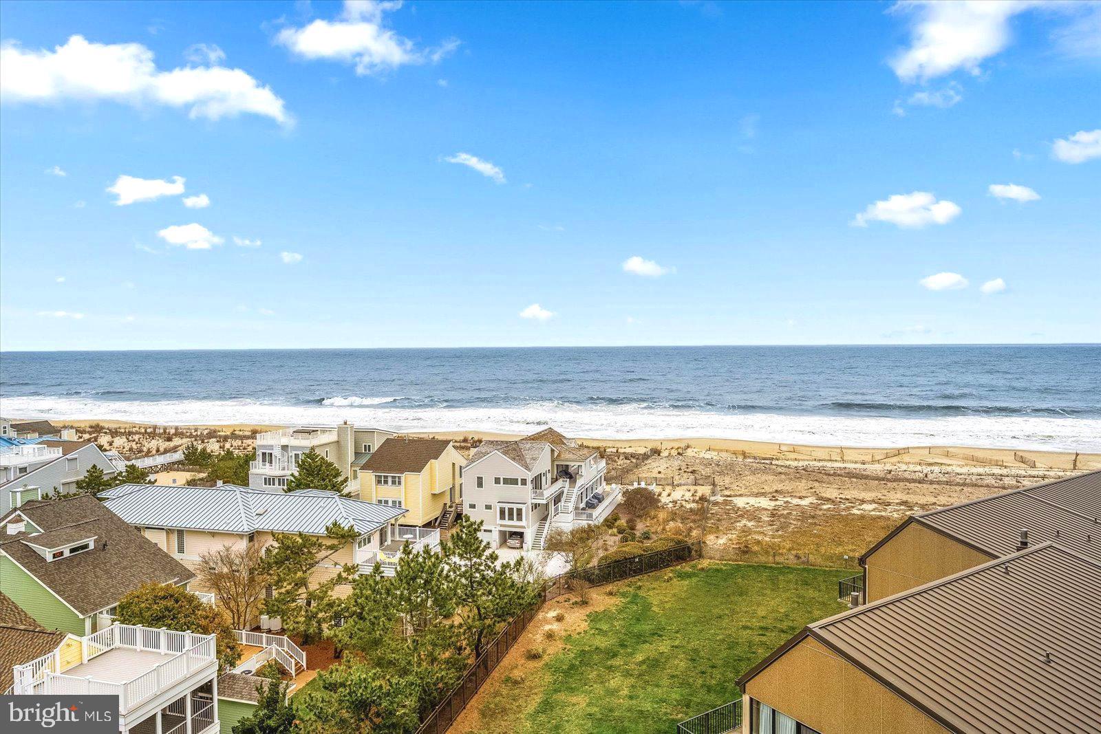 a view of an ocean and a building