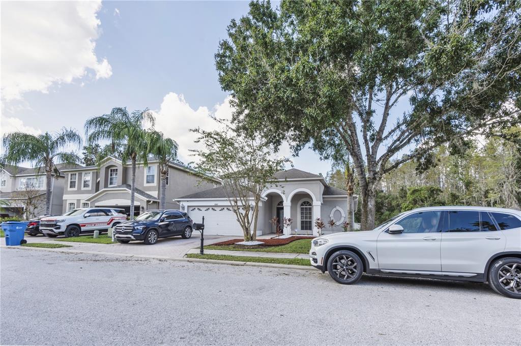 a car parked in front of a house