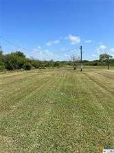 a view of an ocean from a yard