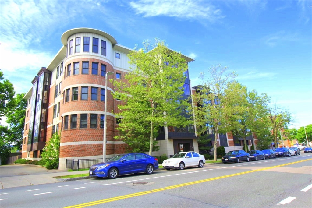 a cars parked in front of a building