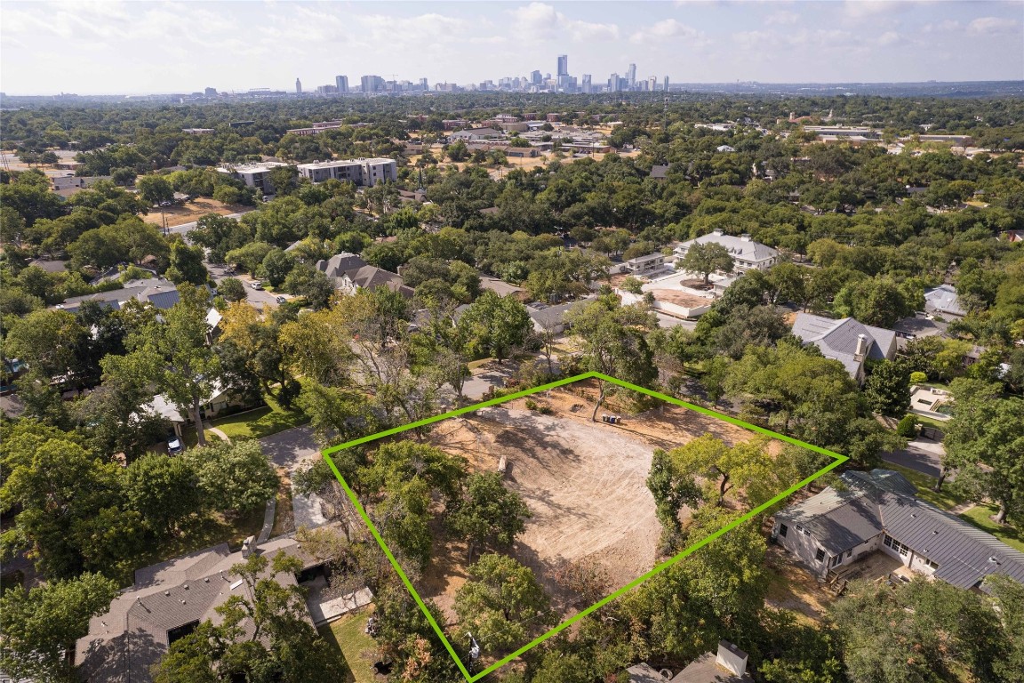 an aerial view of residential house with outdoor space