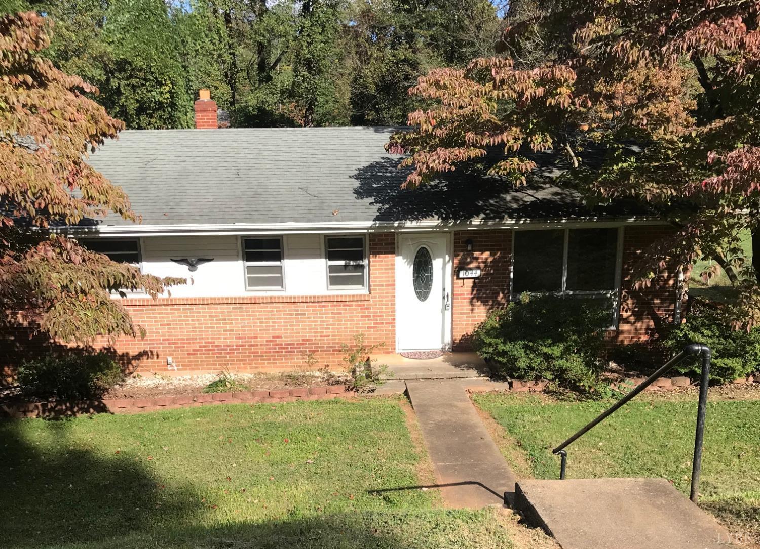 a view of house with outdoor space