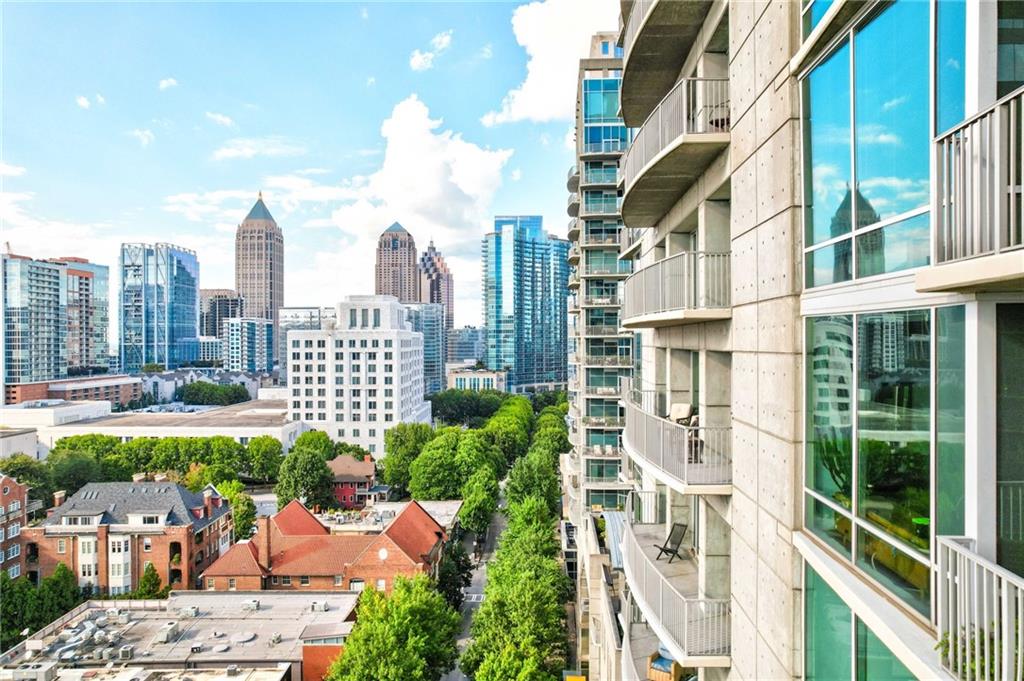 a view of a city with tall buildings