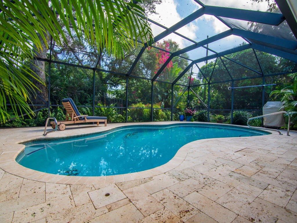 a view of a swimming pool with a sitting space