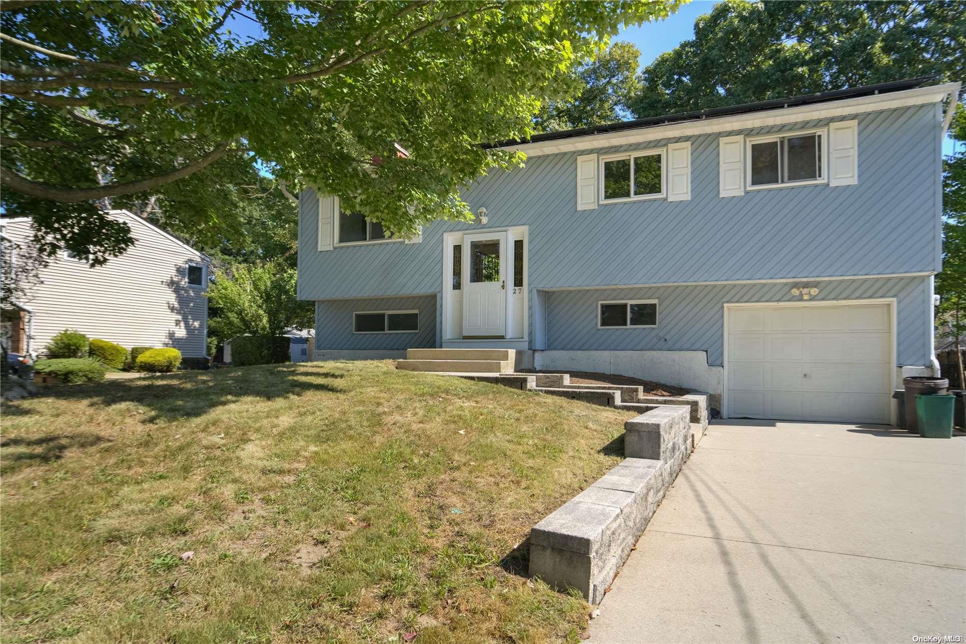 a view of house with yard