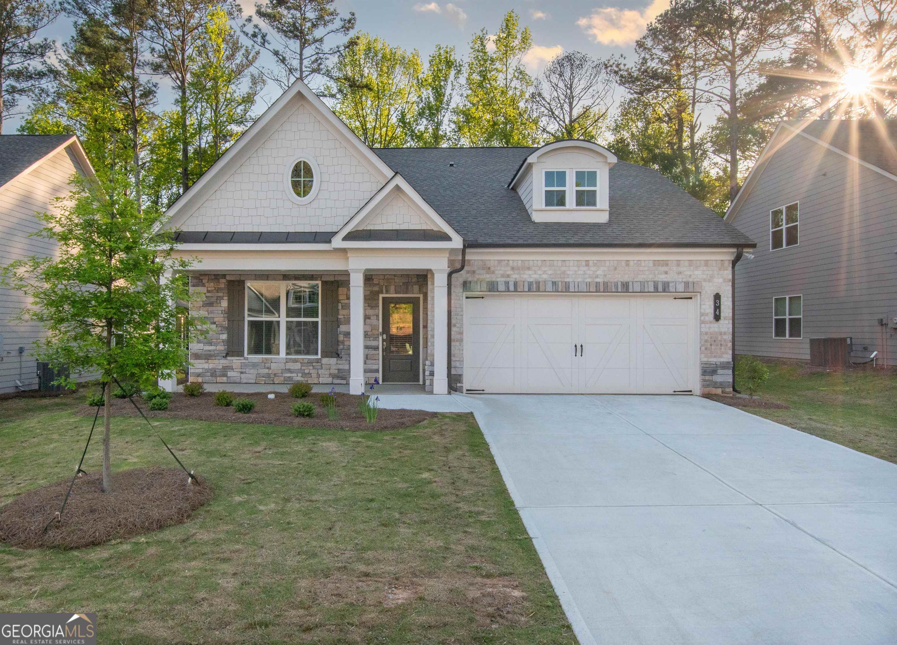 front view of a house with a yard