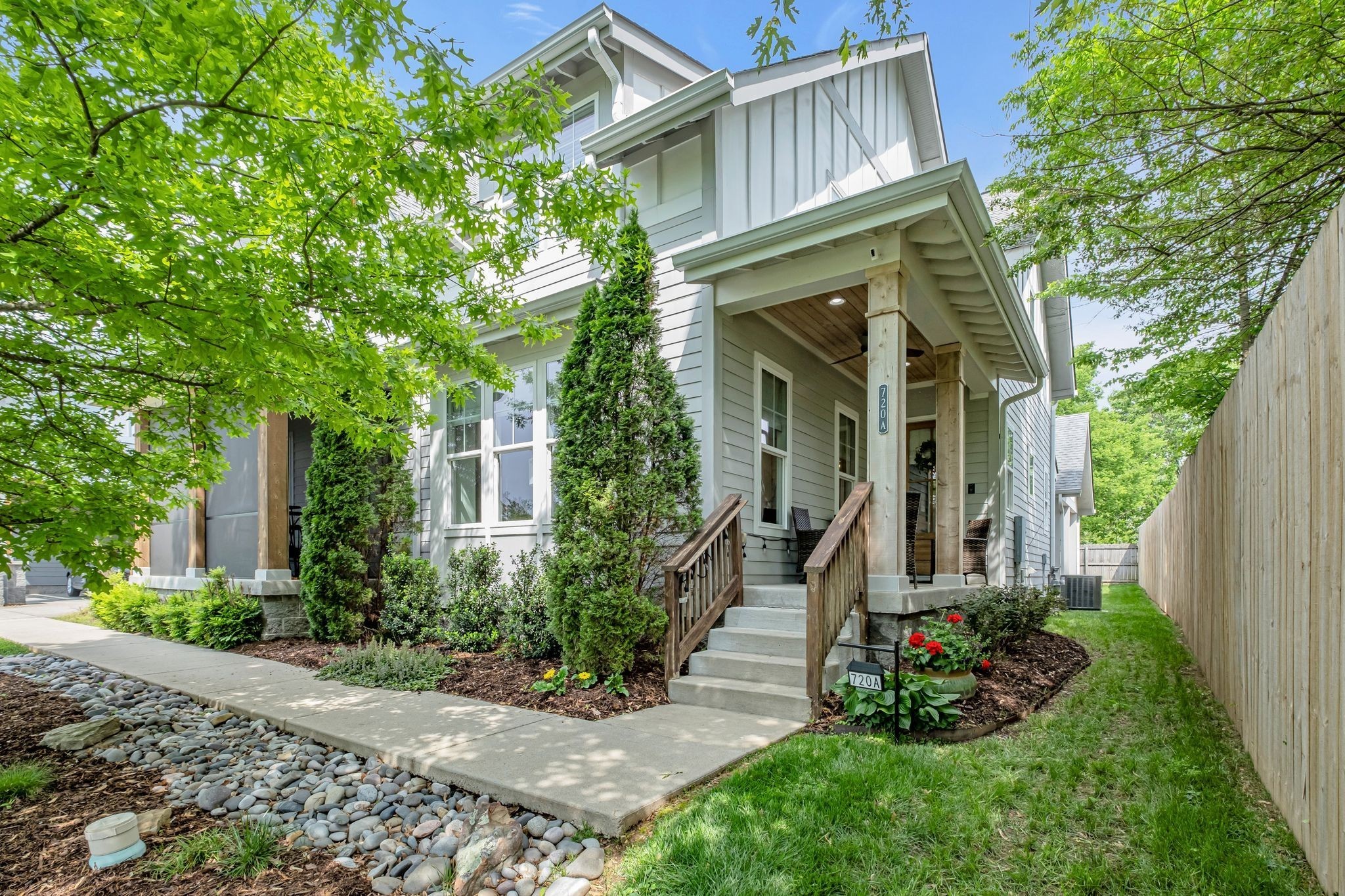 front view of a house with a yard