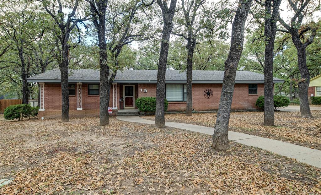 a house with trees in the background