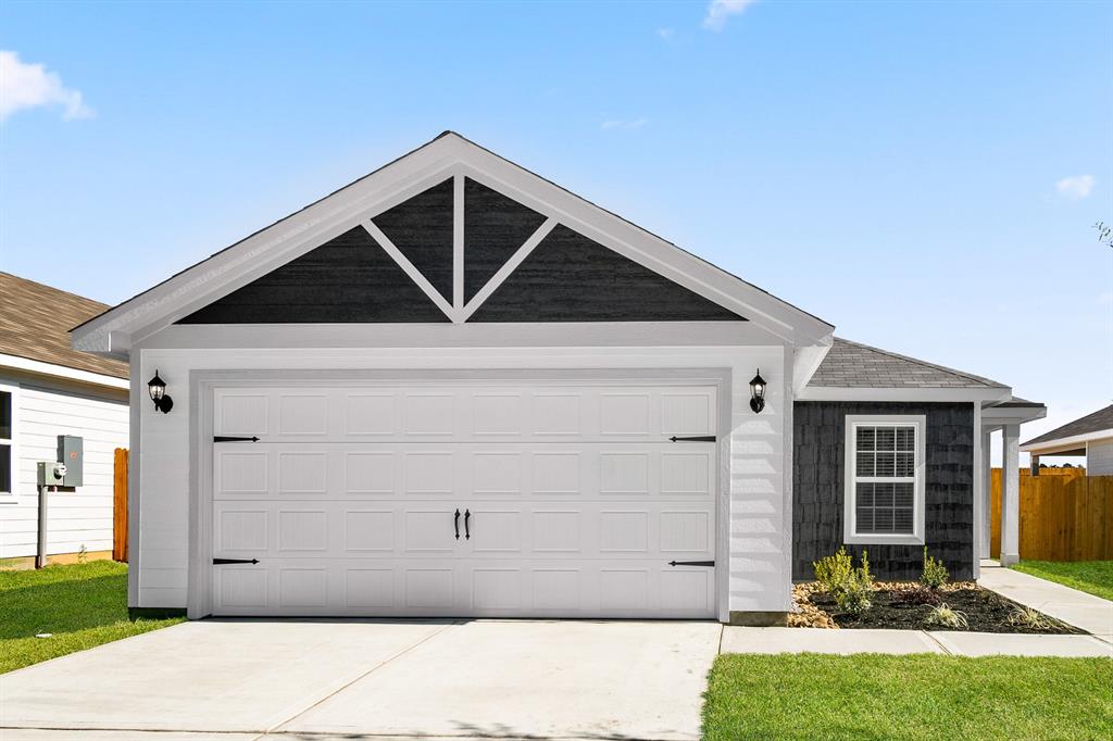 a front view of a house with yard