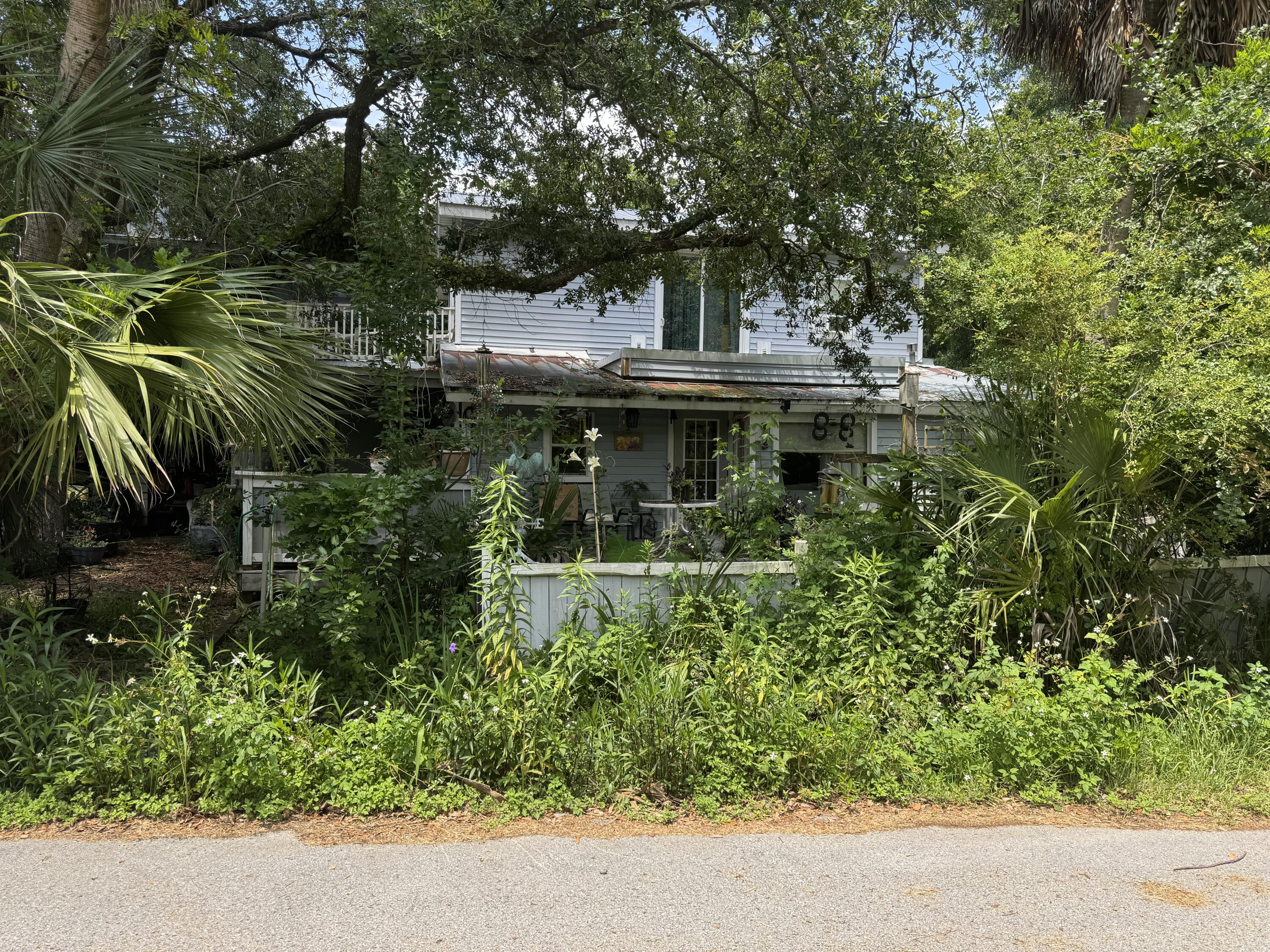 an outdoor view of house with green space