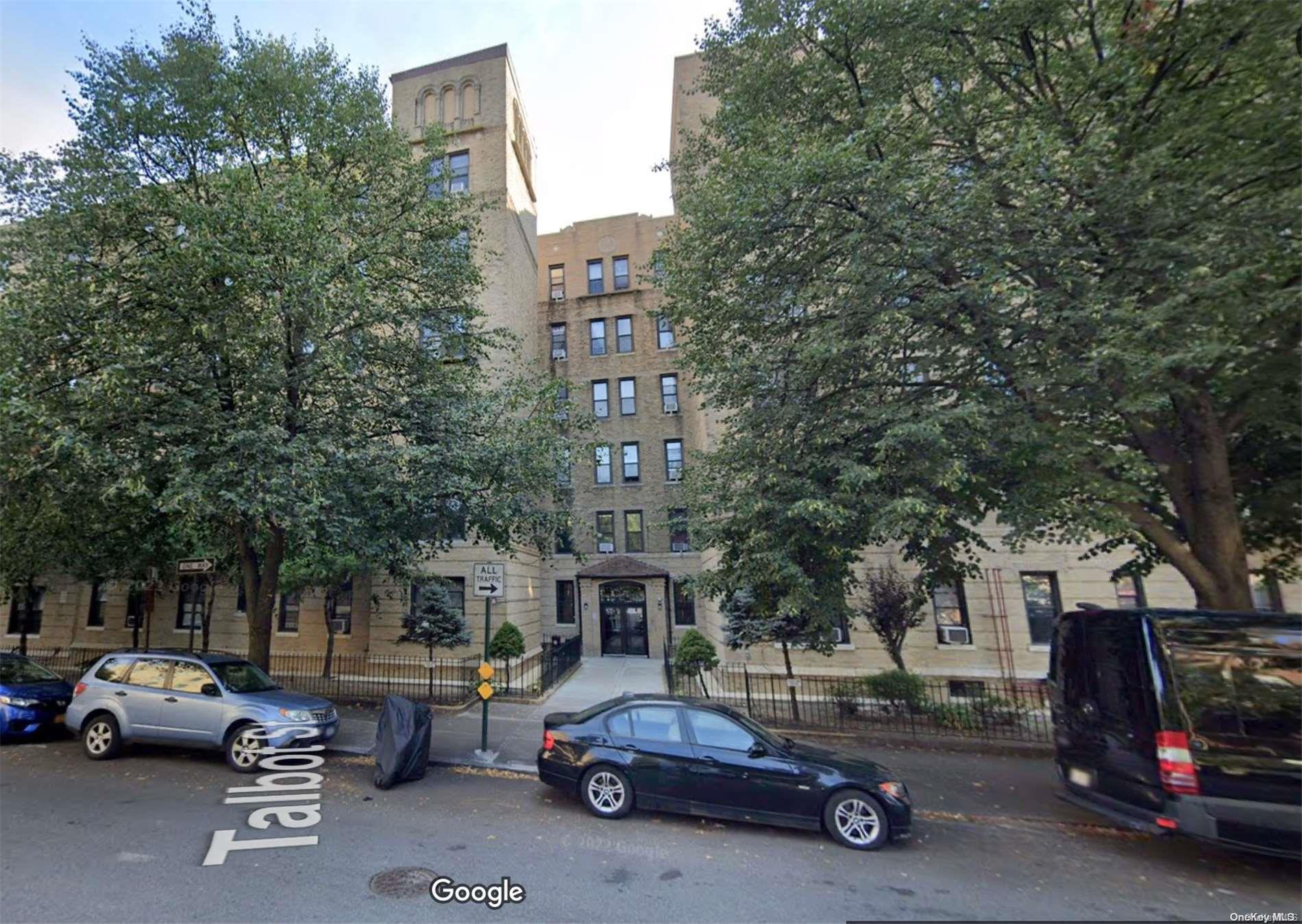 a car parked in front of the building