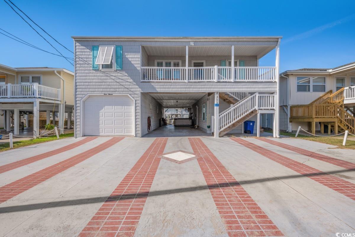 View of front of home with a garage