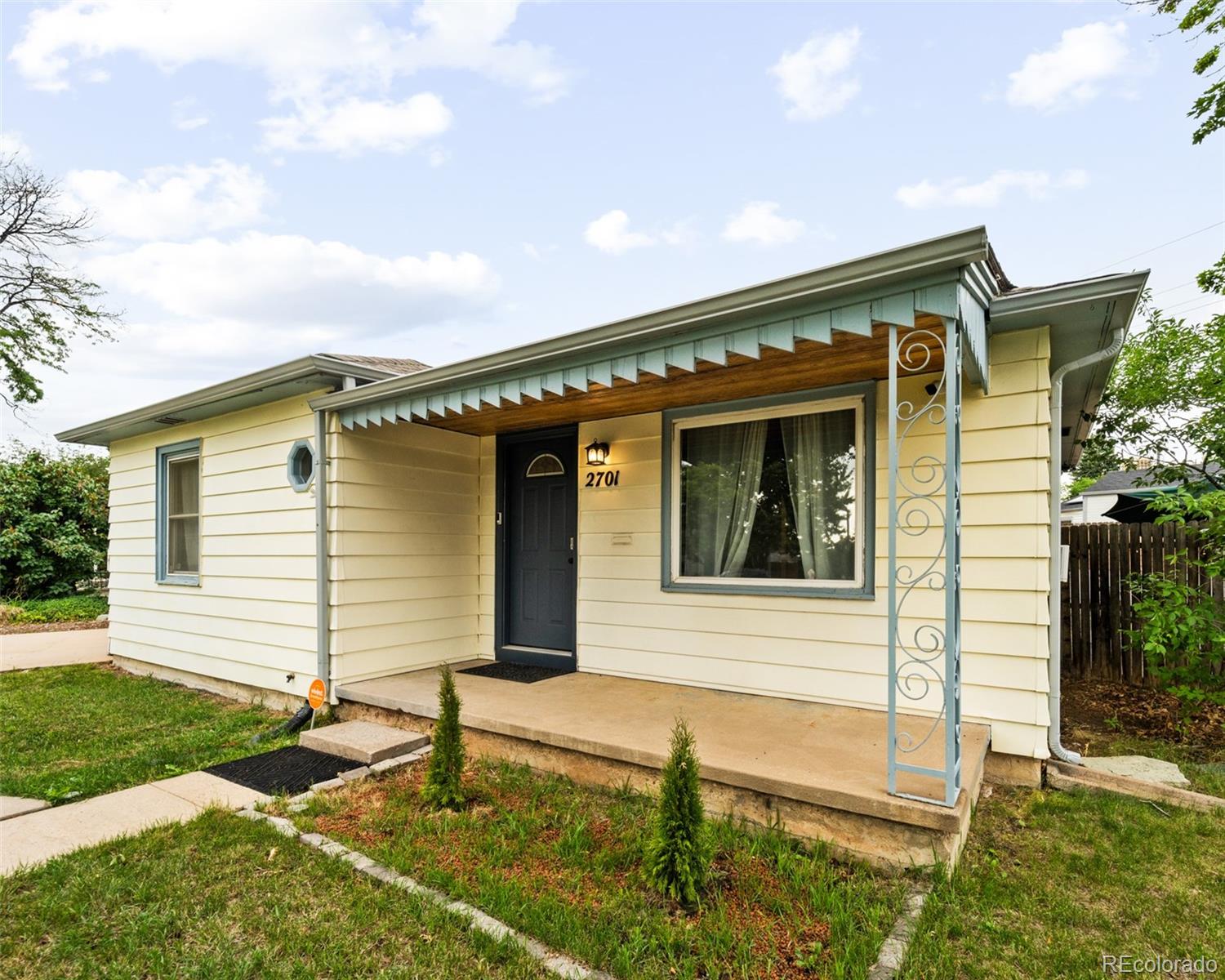 a front view of a house with garage