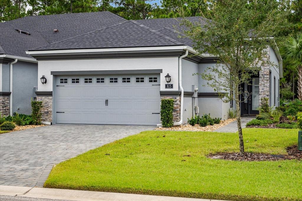 a front view of house with yard