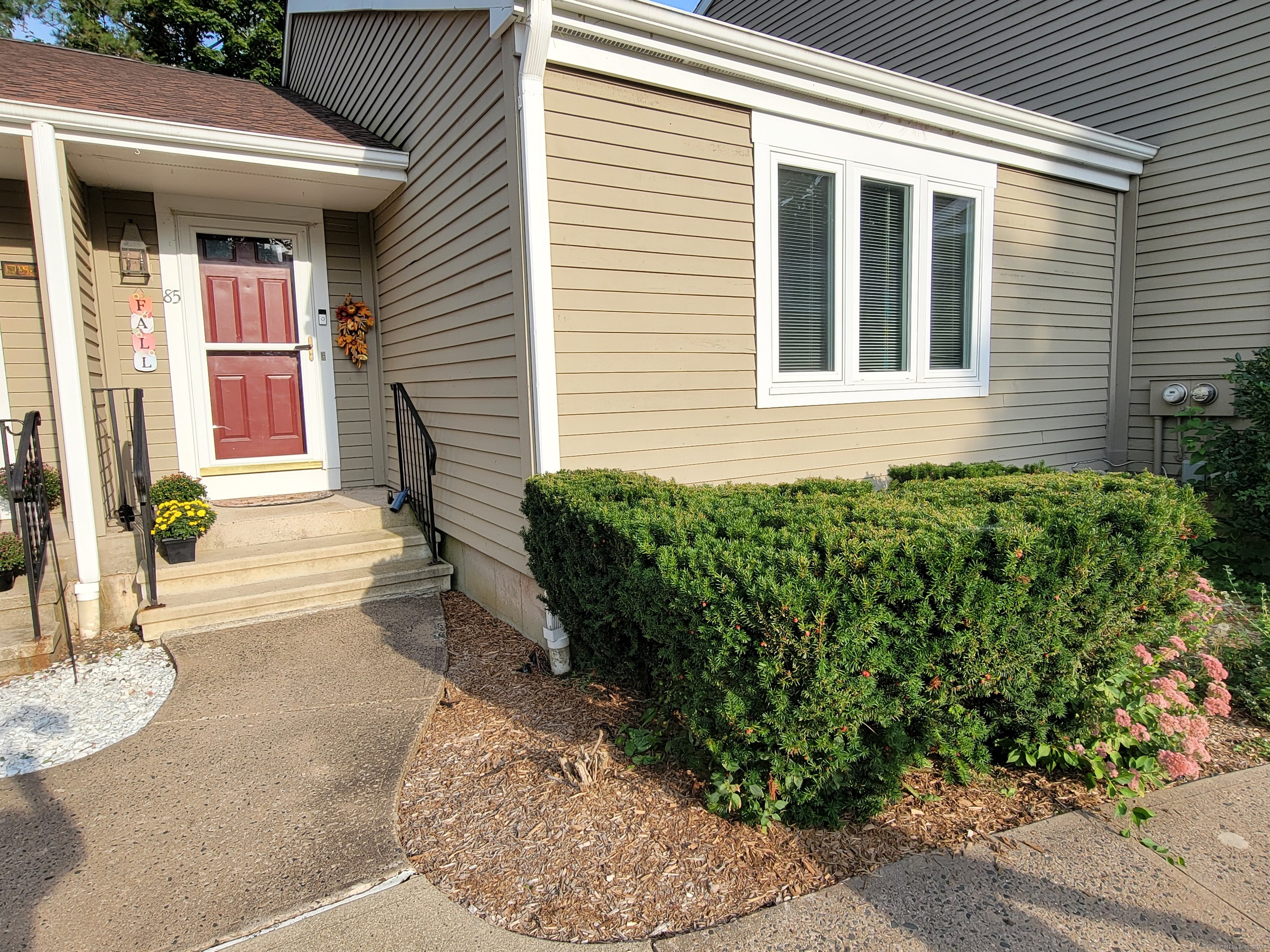 a view of a entryway door front of house