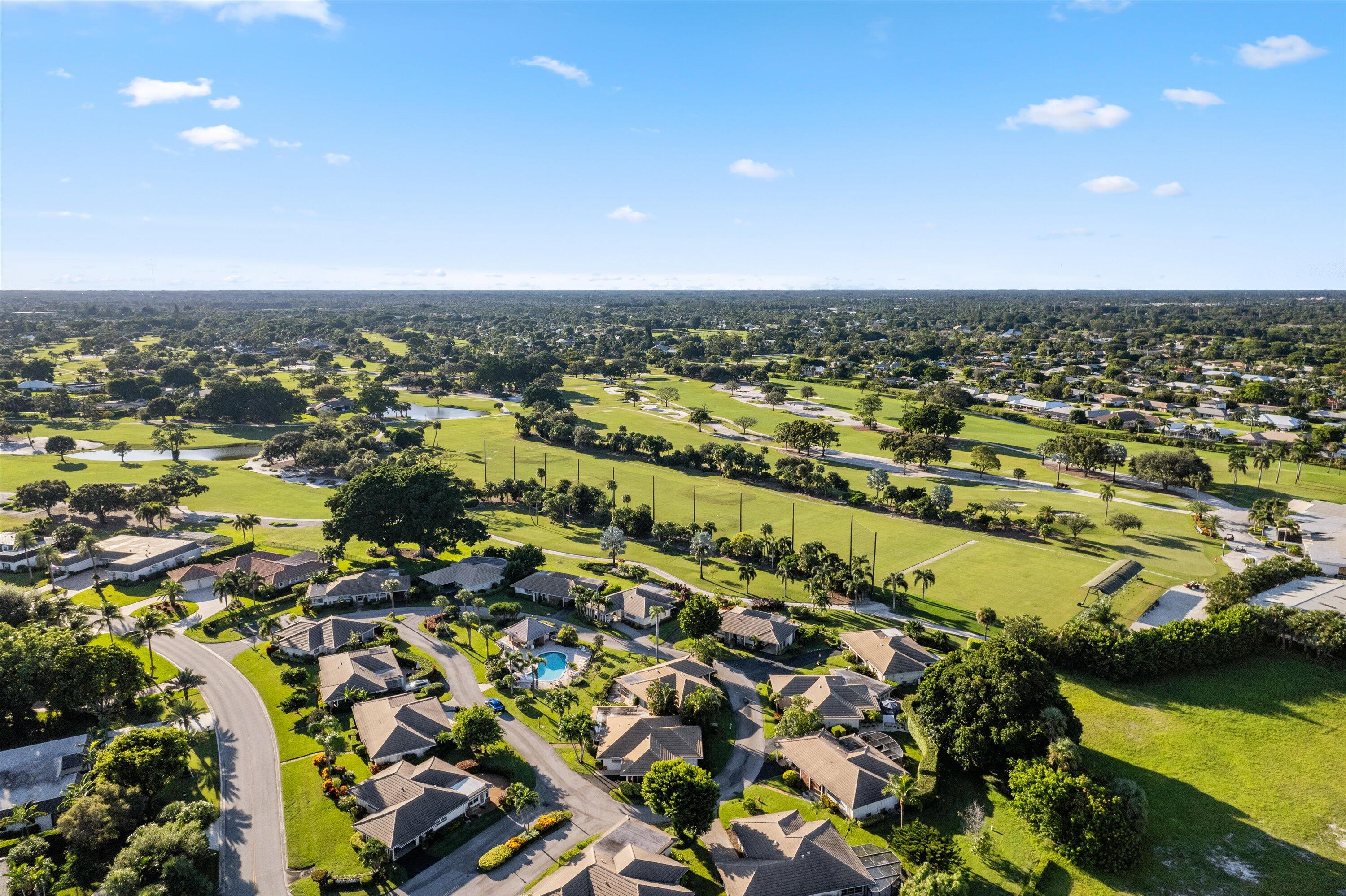 an aerial view of residential building and ocean