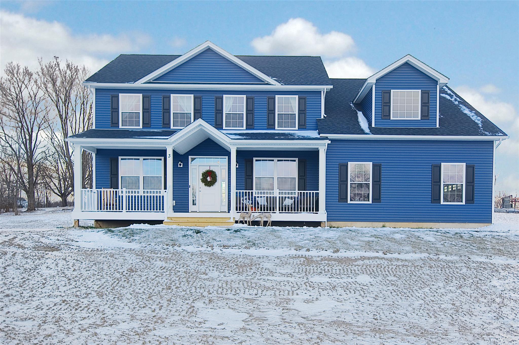 View of front of home with a porch