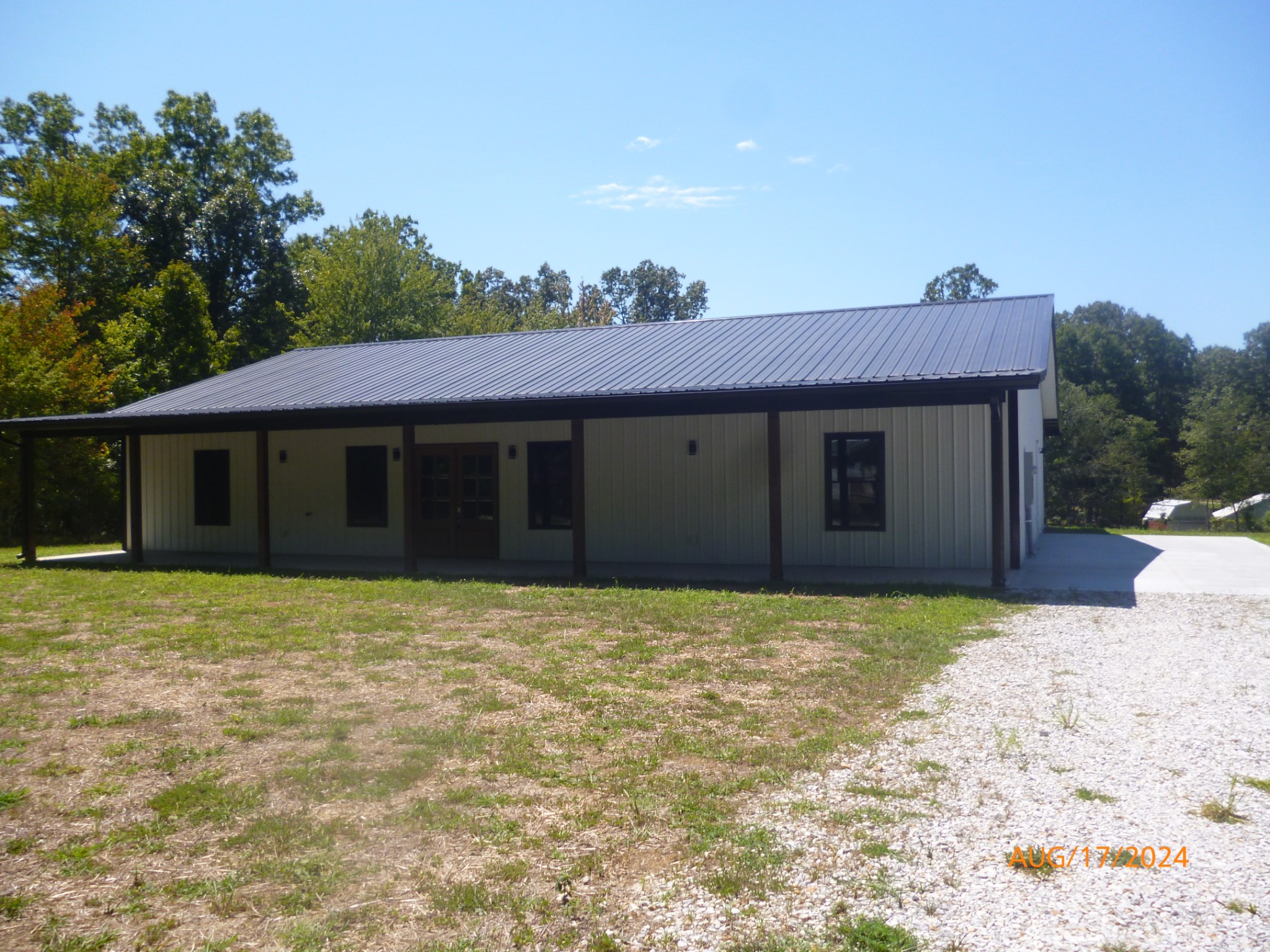 Rustic barn-dominium style home, spacious rooms, easy one-level living.