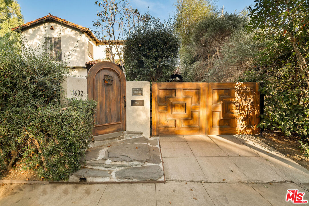 a view of entrance gate of a house