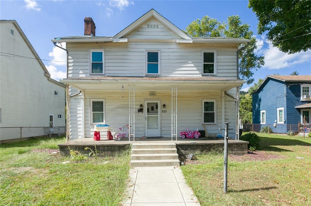 a front view of house with yard