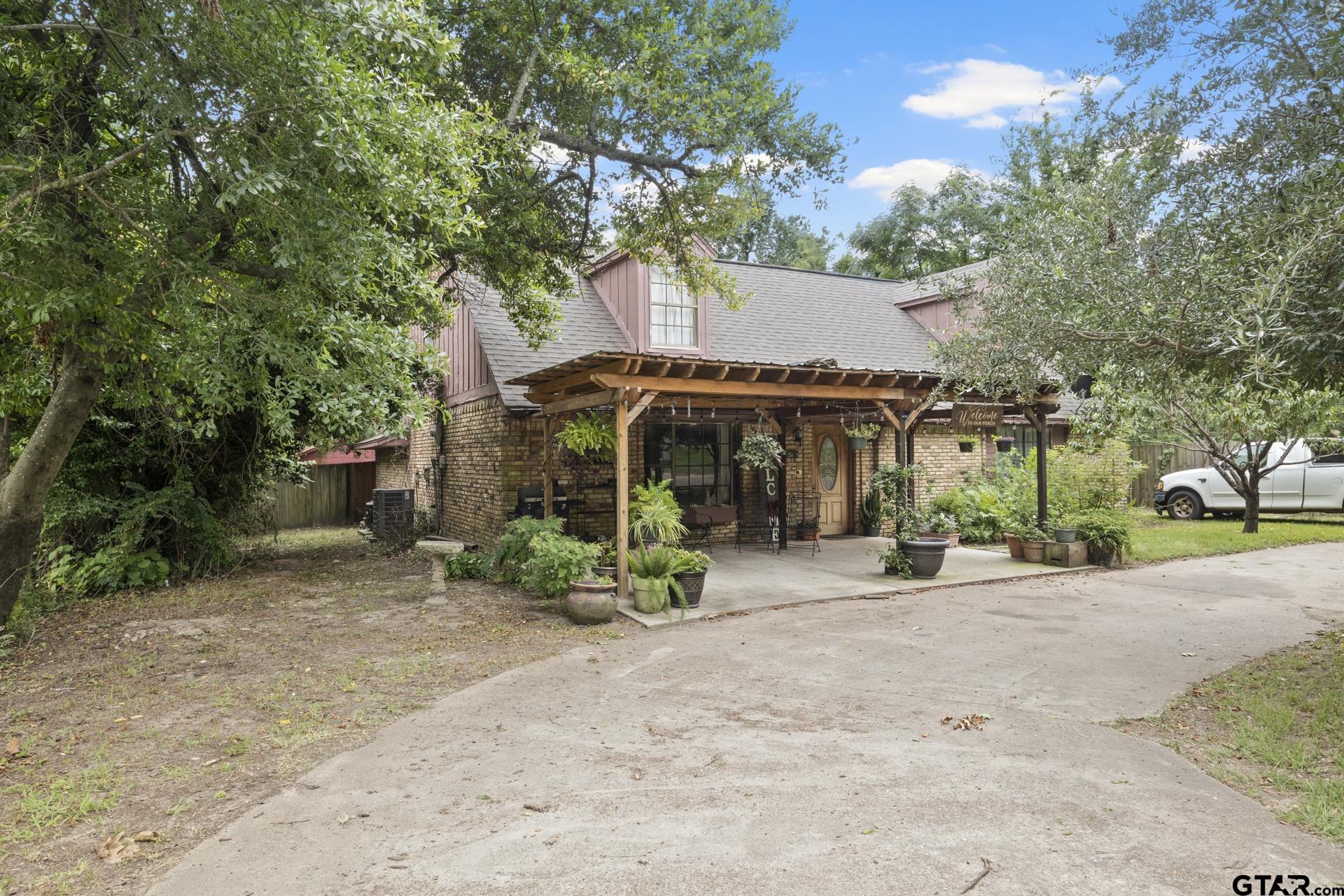 a view of a house with a patio