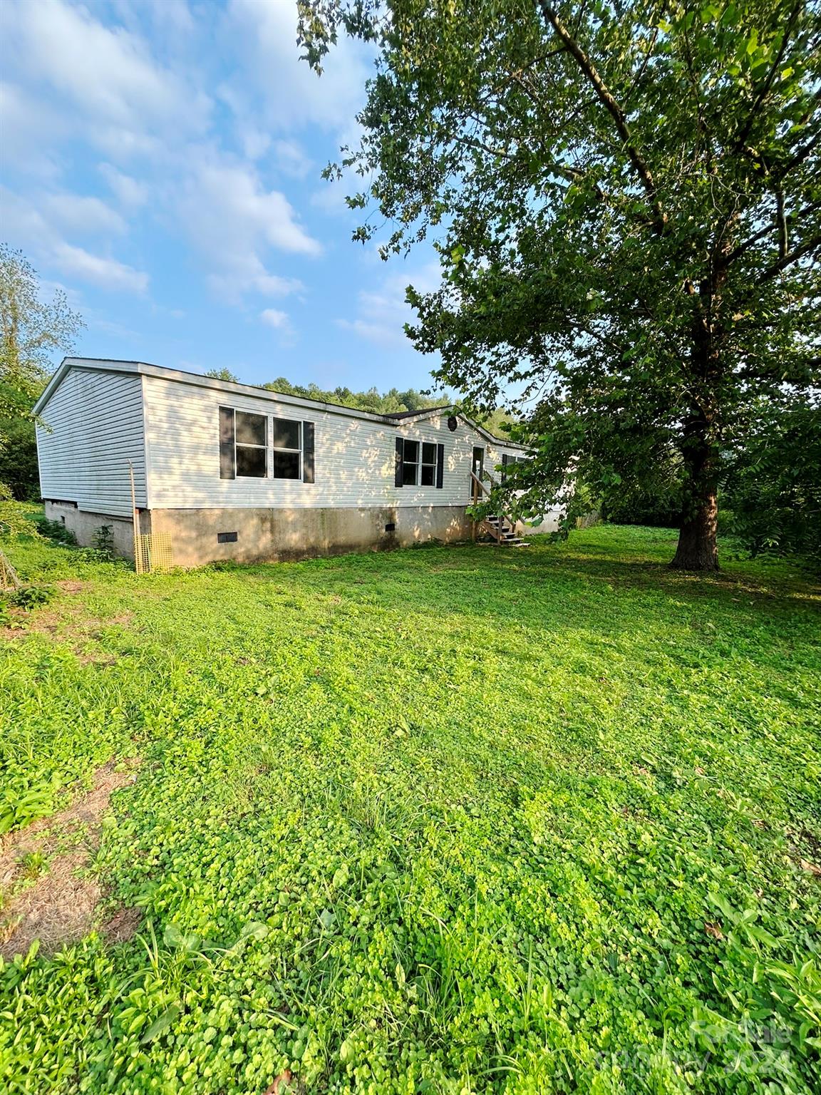 a house view with a garden space