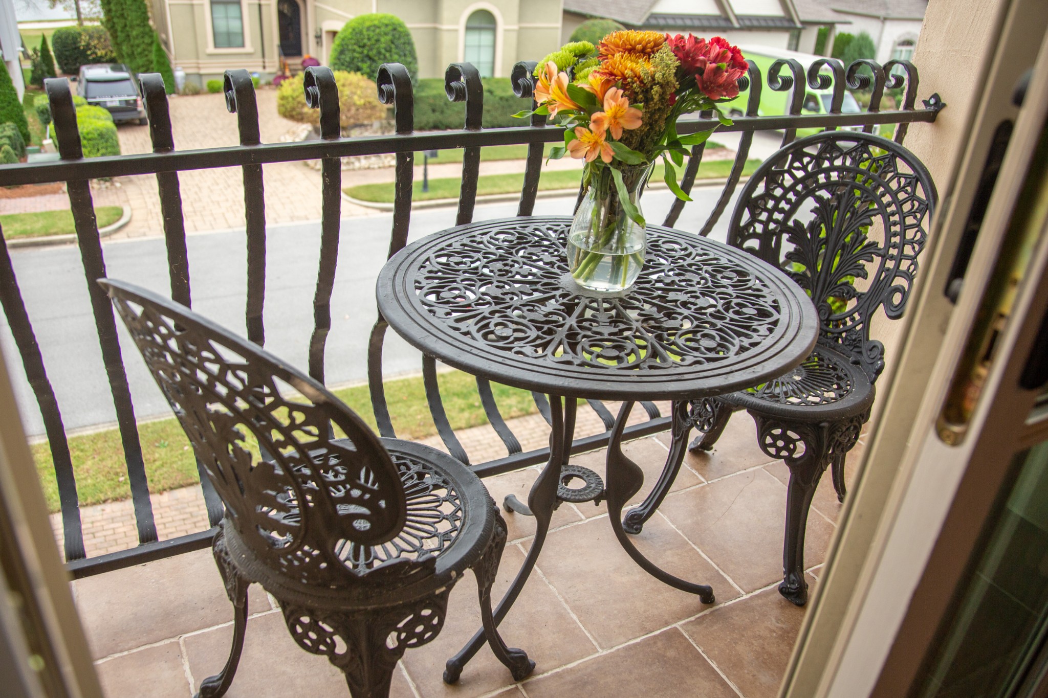 a view of a balcony dining area