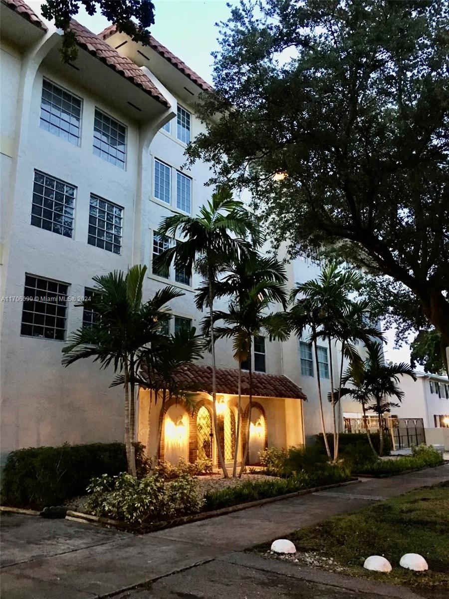 a view of a house with a swimming pool