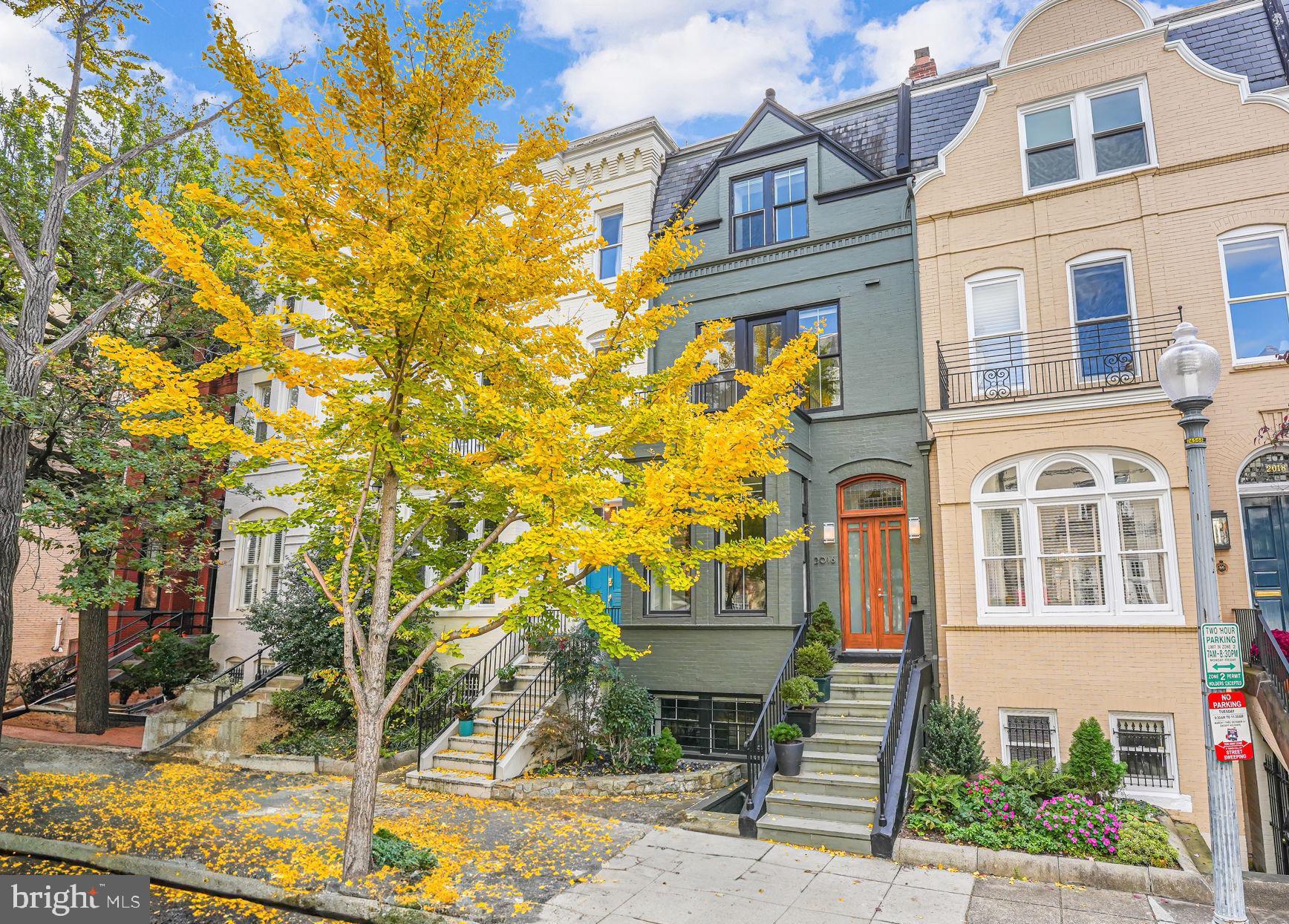 a front view of a multi story residential apartment building