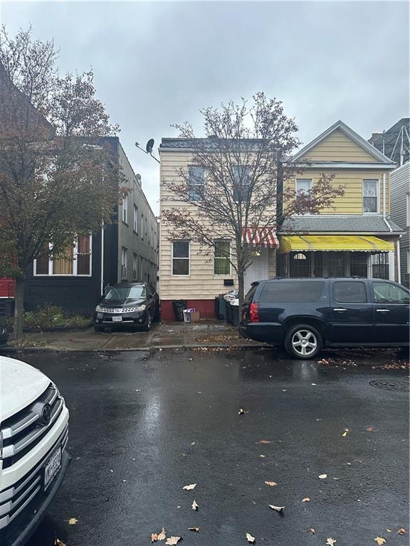 a car parked in front of a house