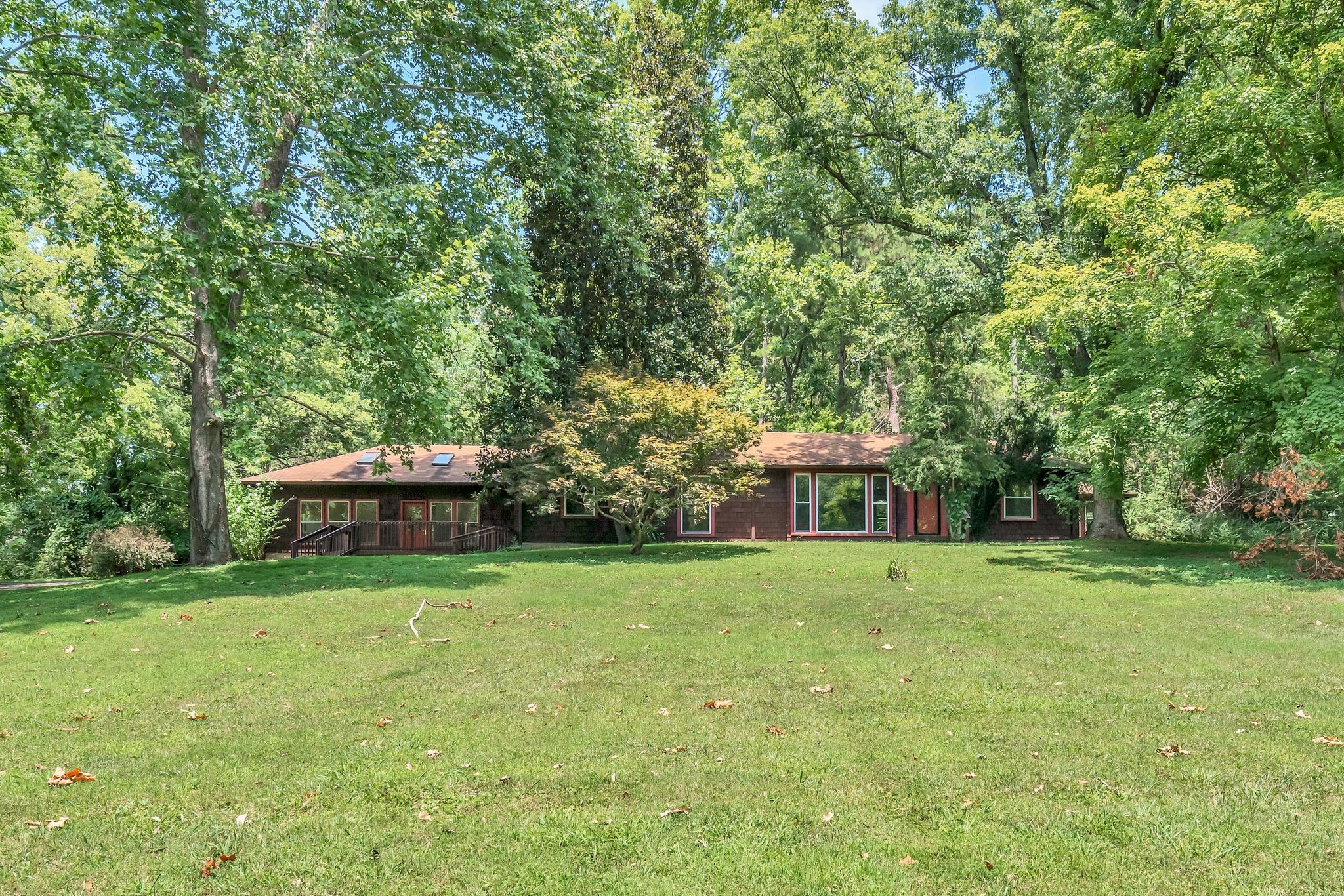 Welcome to 4317 Pecan Valley Road, a woodsy oasis in one of the city's prettiest settings. Secluded, yet just fifteen minutes from downtown Nashville.