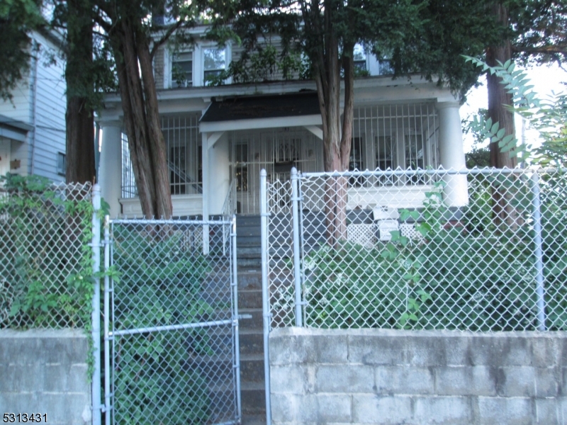 front view of a house with a glass door