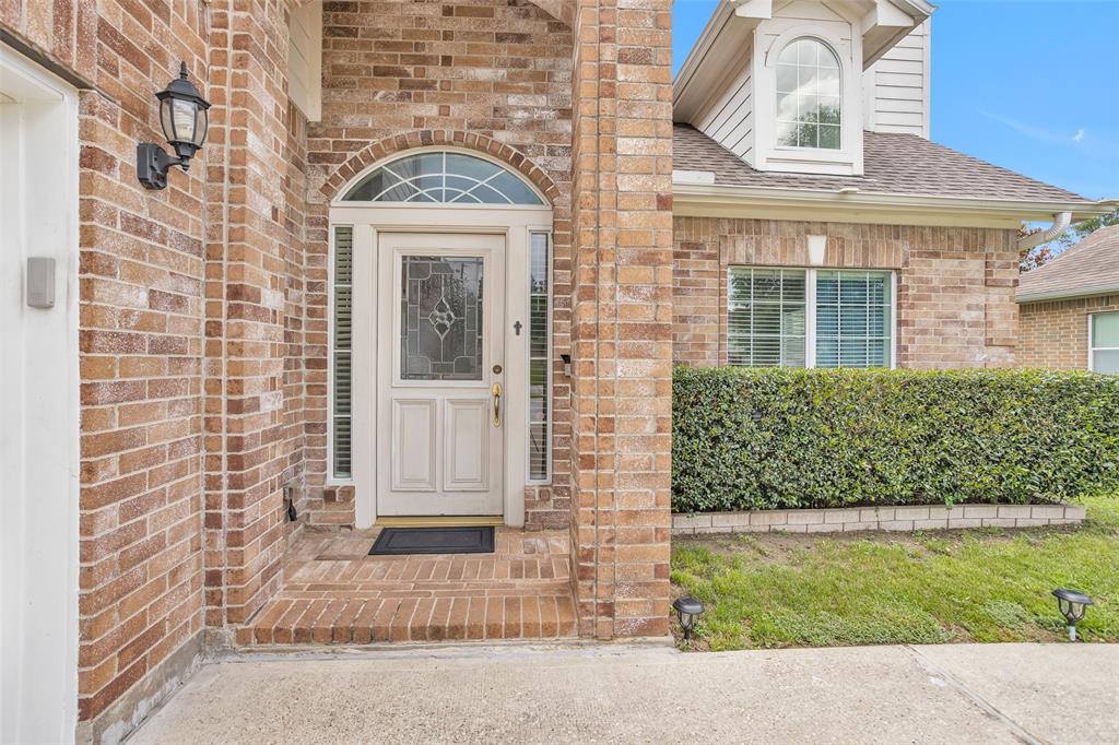 THIS FANTASTIC HOME HAS A 2 STORY COVERED ENTRY.