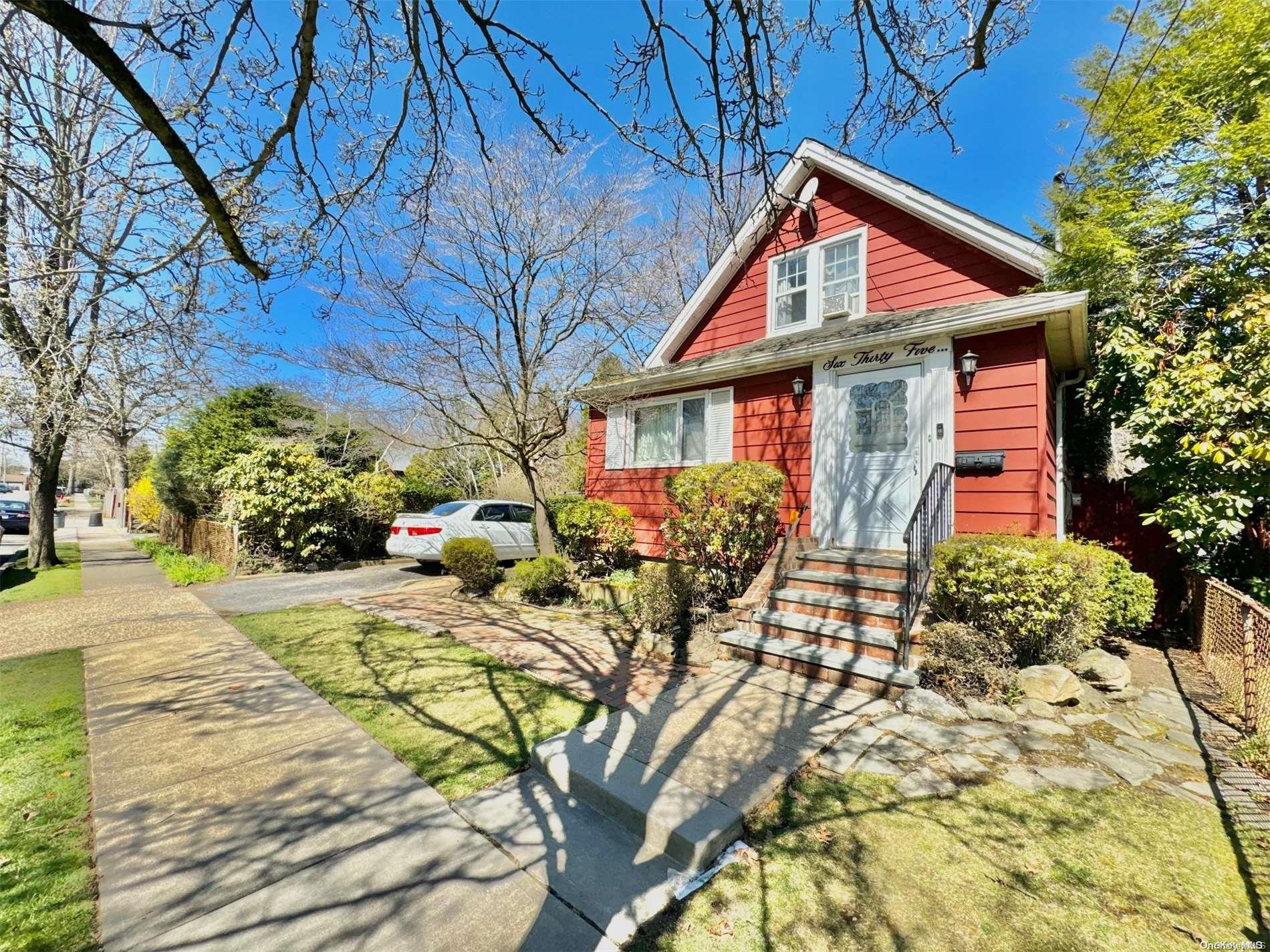 a front view of house with yard