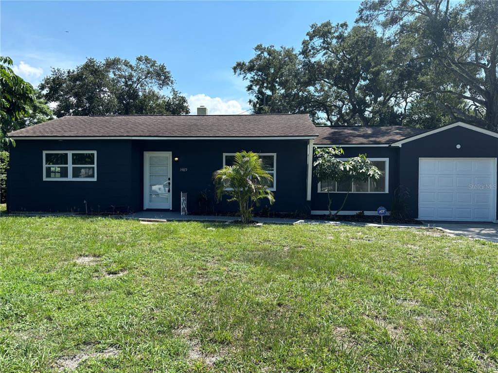 a front view of house with yard