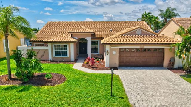 $995,000 | 9720 Enchanted Pointe Lane | Boca Gardens