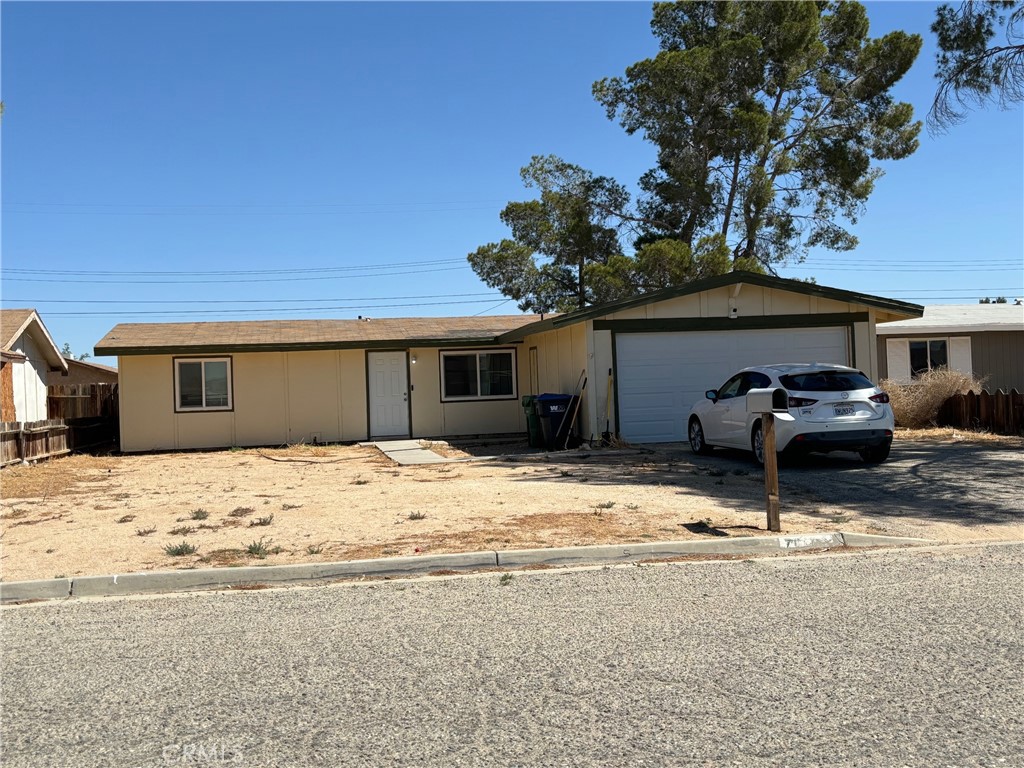 a house with trees in front of it