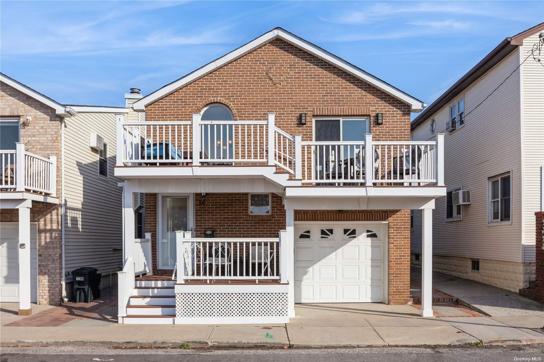 a front view of a house with a porch