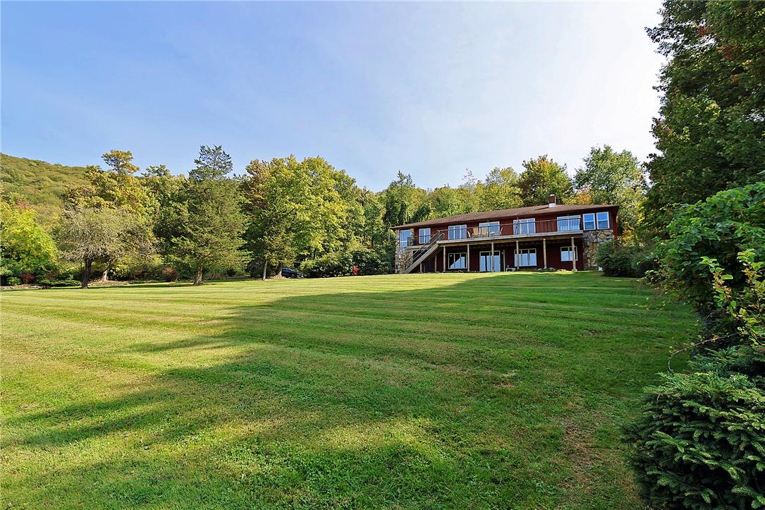 Expansive front yard (more private yard in back)