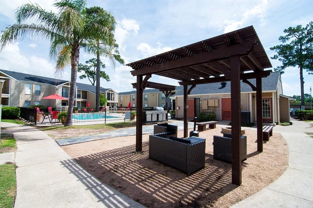 a view of a patio with swimming pool table and chairs