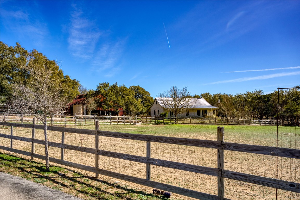 a view of a house with a big yard