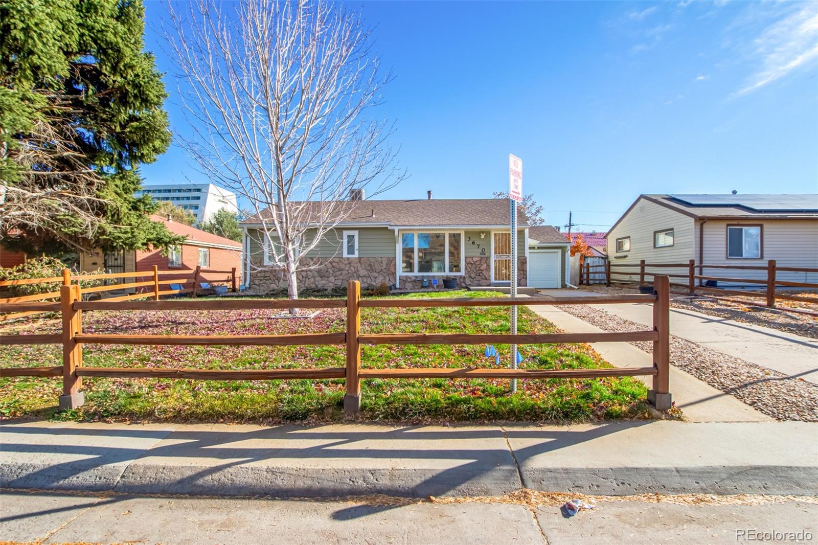 a view of a house with a small yard