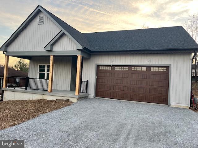 a view of a house with a garage