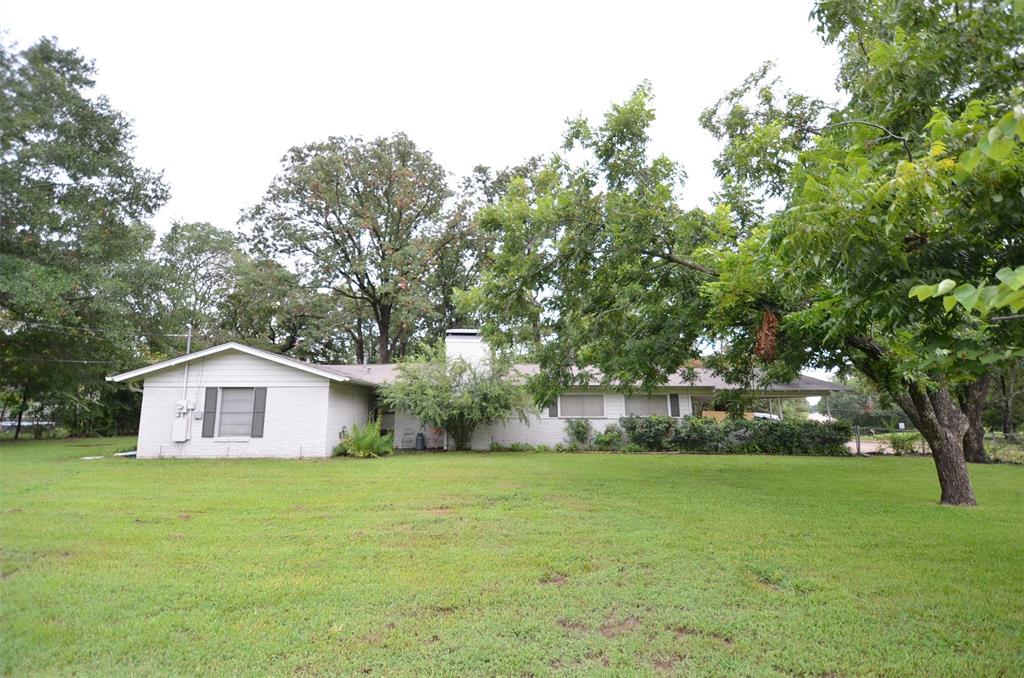 a house view with garden space